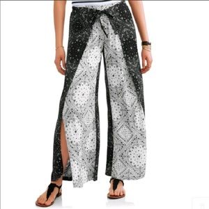 Navy and white palazzo pants with leg slits